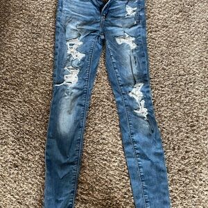 Women's Distressed Blue Jeans